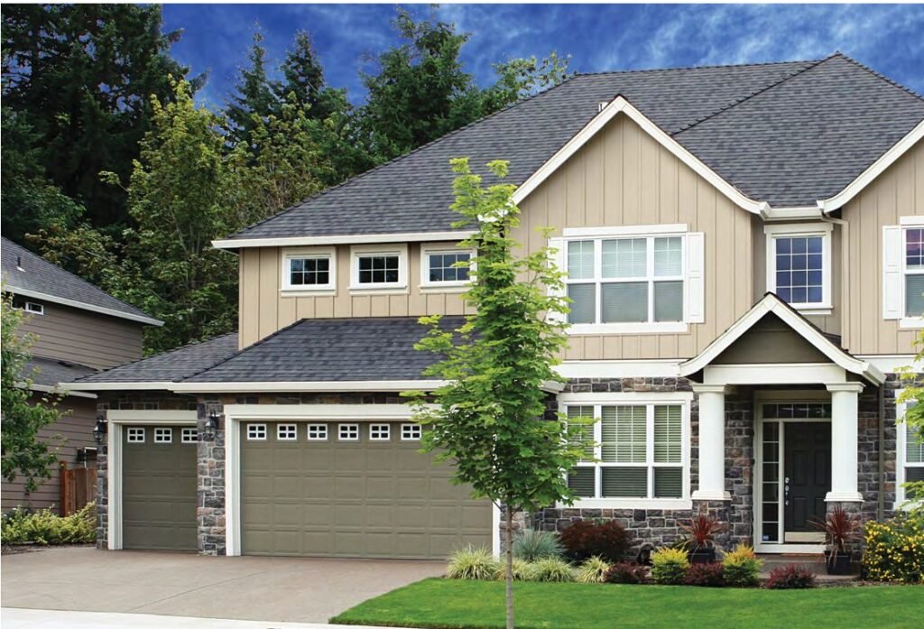 Home with tan Gentek SteelTek Supreme 12-inch board and batten steel siding